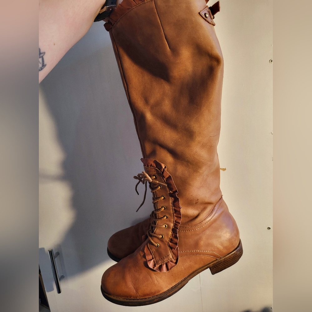 Calf height leather boots